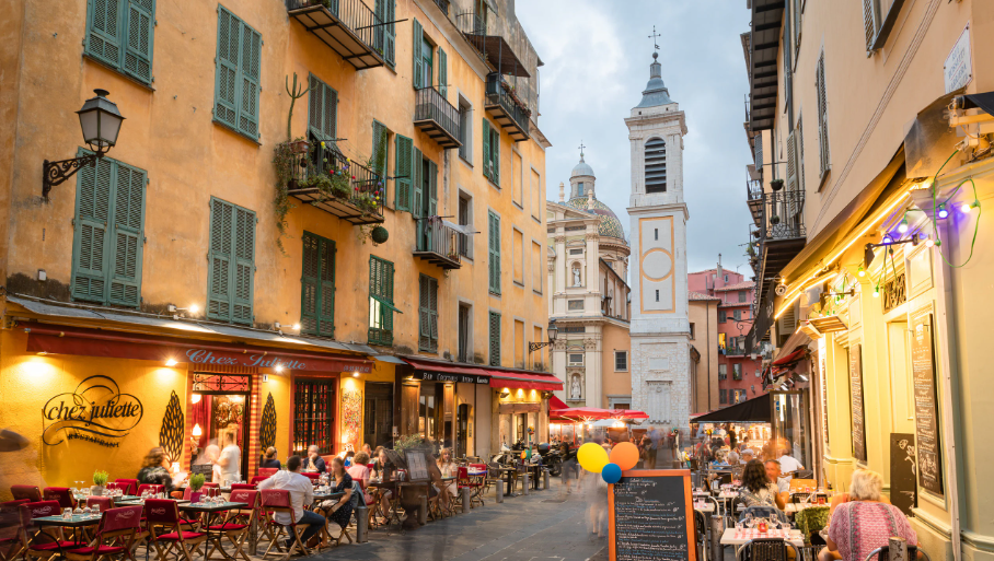 A welcoming pedestrian street with cafes in Old Nice, France